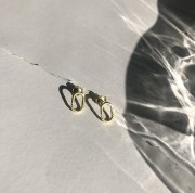 Srebrne pozłacane kolczyki podłużne twist