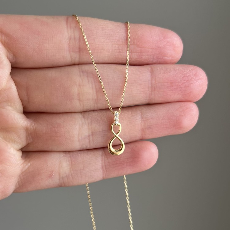 Złoty naszyjnik nieskończoność z cyrkoniami 333