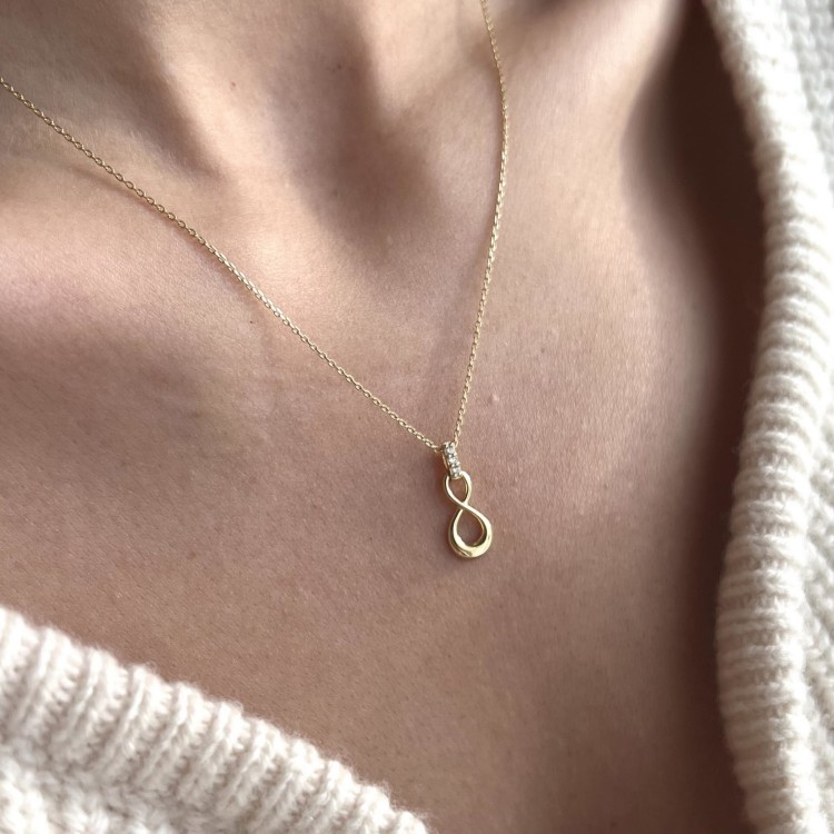 Złoty naszyjnik nieskończoność z cyrkoniami 333