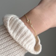 Złoty naszyjnik nieskończoność z cyrkoniami 333