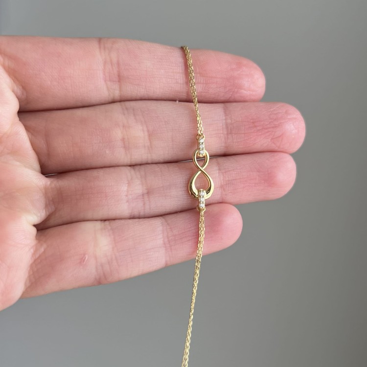 Złoty naszyjnik nieskończoność z cyrkoniami 333