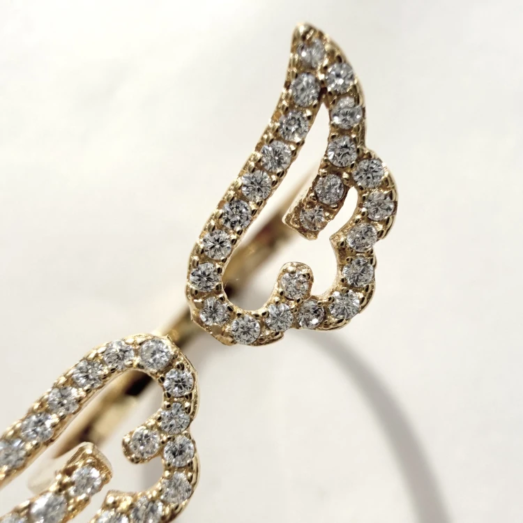 Srebrny pozłacany pierścionek skrzydła z cyrkoniami