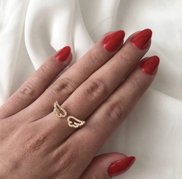 Srebrny pozłacany pierścionek skrzydła z cyrkoniami