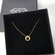 Złoty naszyjnik koło z koniczyną 333