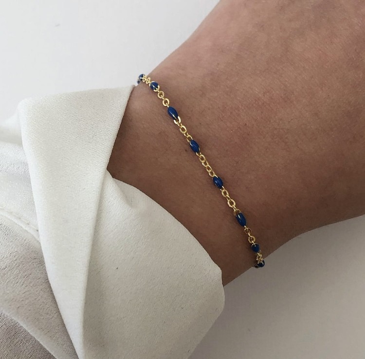 Srebrna pozłacana bransoletka z granatową emalią